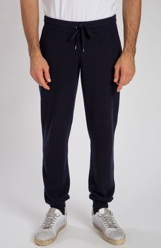 Pantaloni tuta in puro cashmere color blu navy, visto frontale.